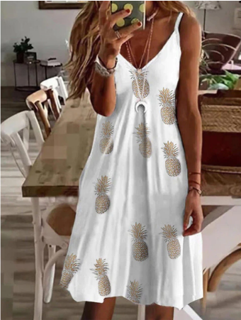 Trendy mini zomerjurk voor dames met spaghettibandjes en levendige boho print; ideaal als strandjurk.