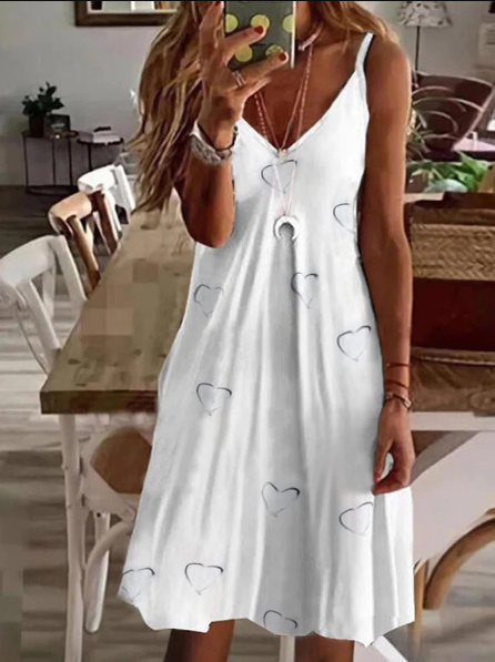 Vrolijke print boho zomerjurk voor dames, comfortabel en stijlvol met spaghettibandjes; jouw trendy vakantiejurk.
