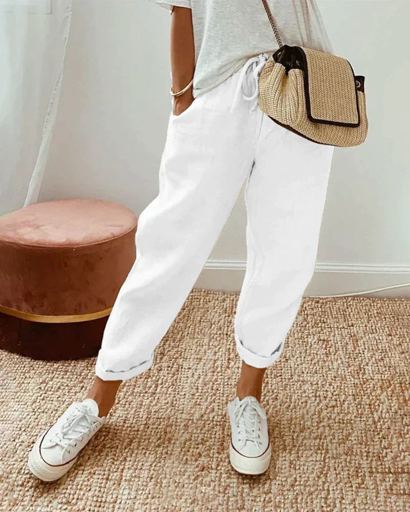 Stijlvolle dames linnen broek met losse pasvorm. Ideaal voor een elegante, casual zomerlook.