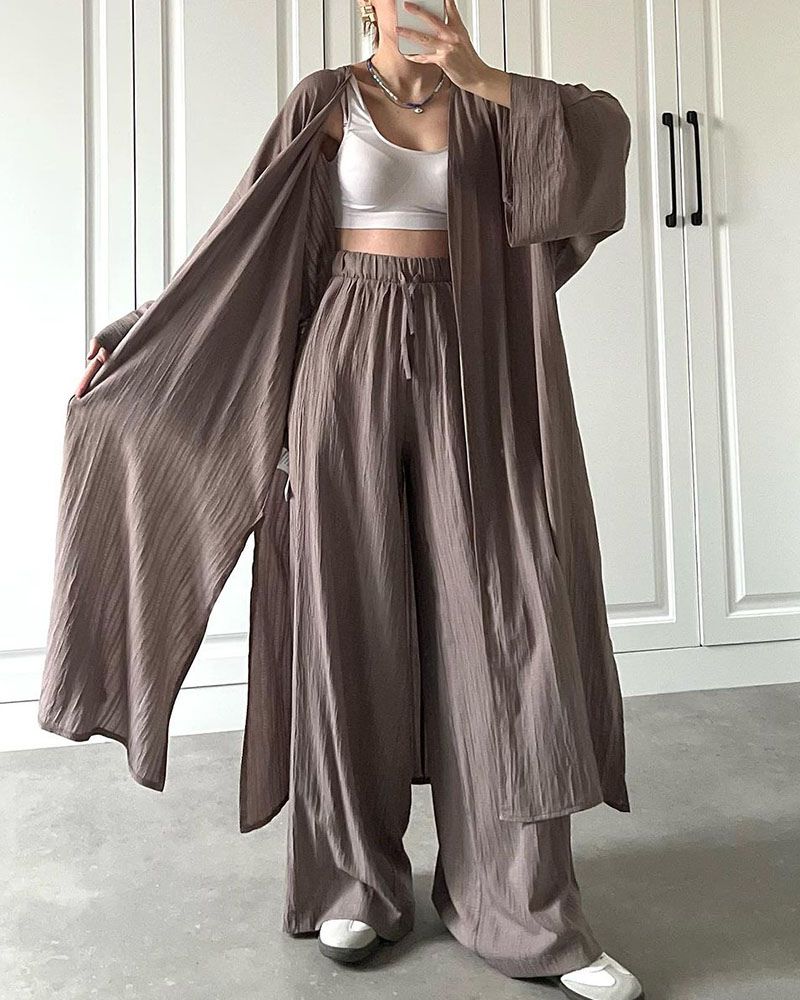 Dames mode essentieel: comfortabele tweedelige set met vest en broek voor een moeiteloze casual look.
