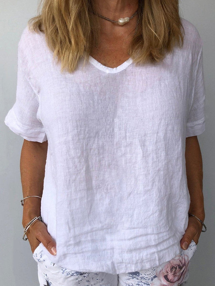 Dames casual V-hals top met korte mouwen, ideaal voor zomer en lente. Comfortabele, losvallende dagelijkse kleding.