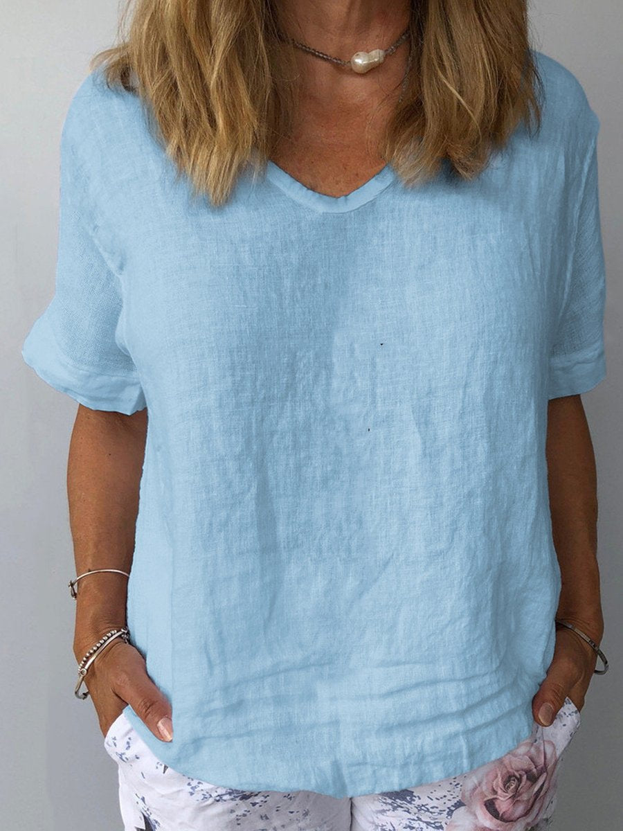 Zomerse dames V-hals top met korte mouwen, losvallend en comfortabel. Ideaal voor casual lente mode.