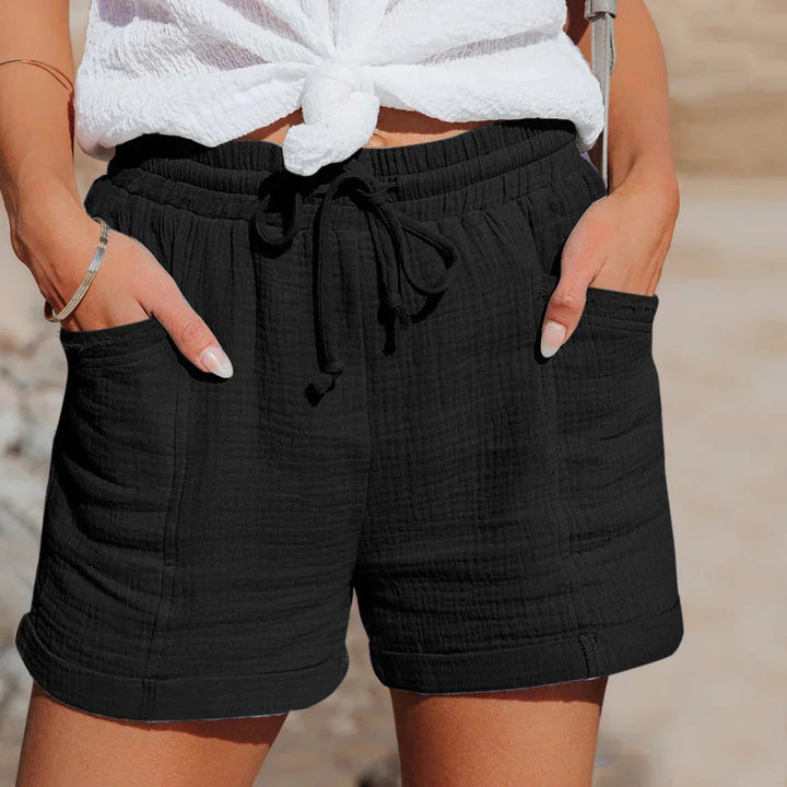 Dames casual zomershorts met elastische tailleband, perfect voor comfortabele zomerdagen en strand. Losse pasvorm.