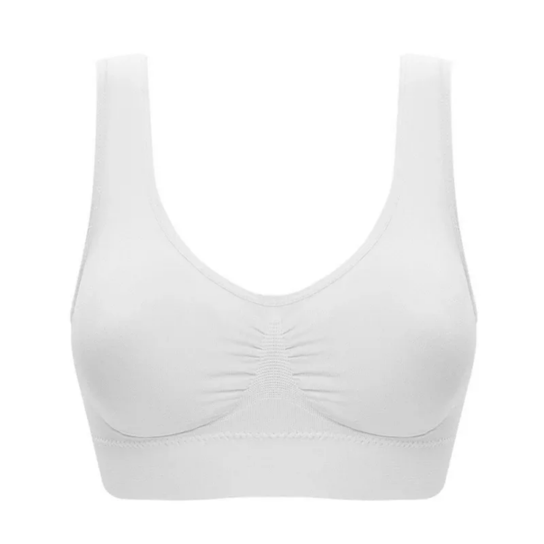 Vrouwelijke beige comfort BH zonder beugel, naadloos en zacht. Biedt uitstekend draagcomfort en lichte ondersteuning.