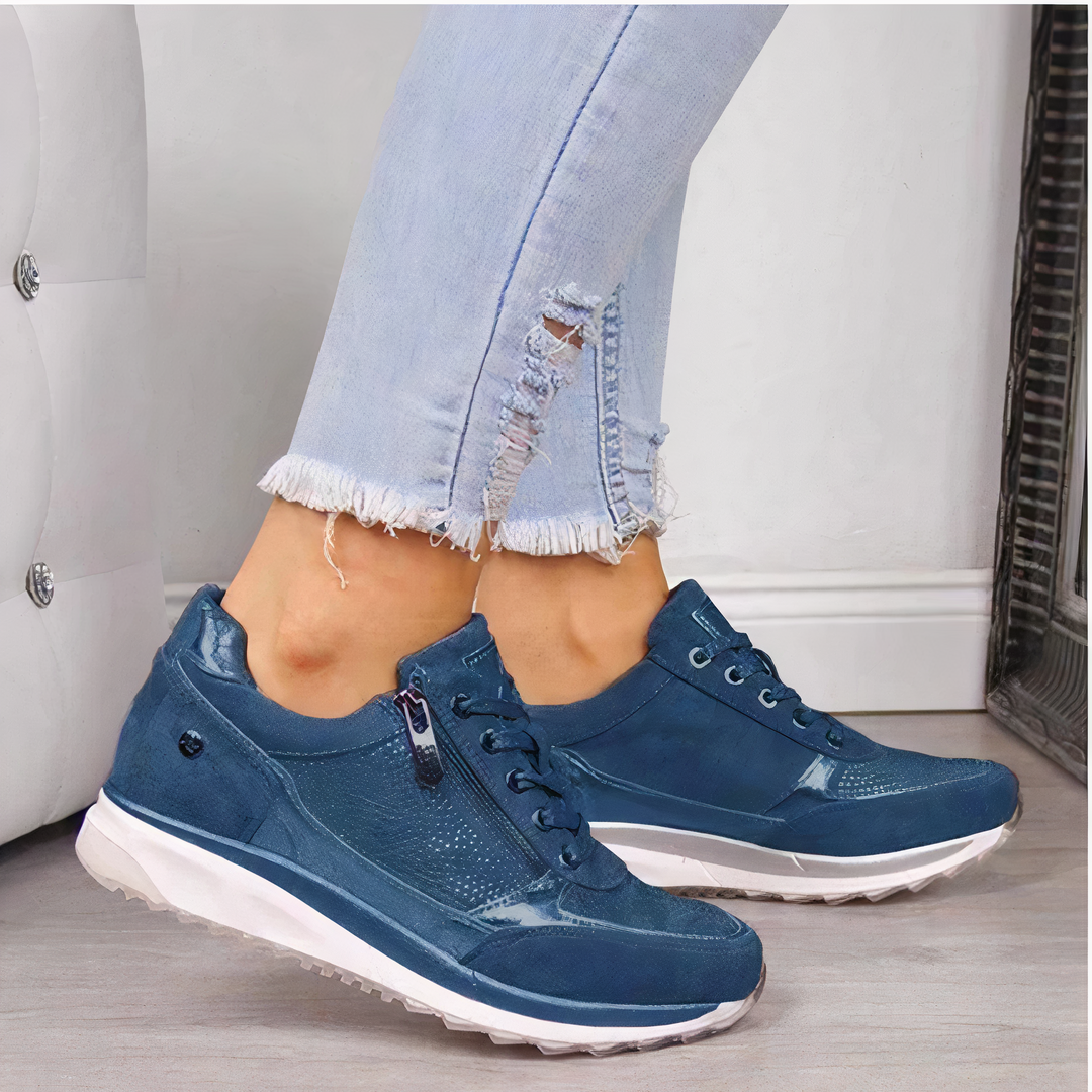 Veelzijdige dames sneakers met zowel veters als rits, ontworpen voor optimaal voetcomfort en actieve levensstijl.