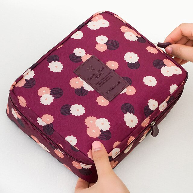 Mooie waterdichte make-up tas in compact design, dames cosmetica organizer voor onderweg.