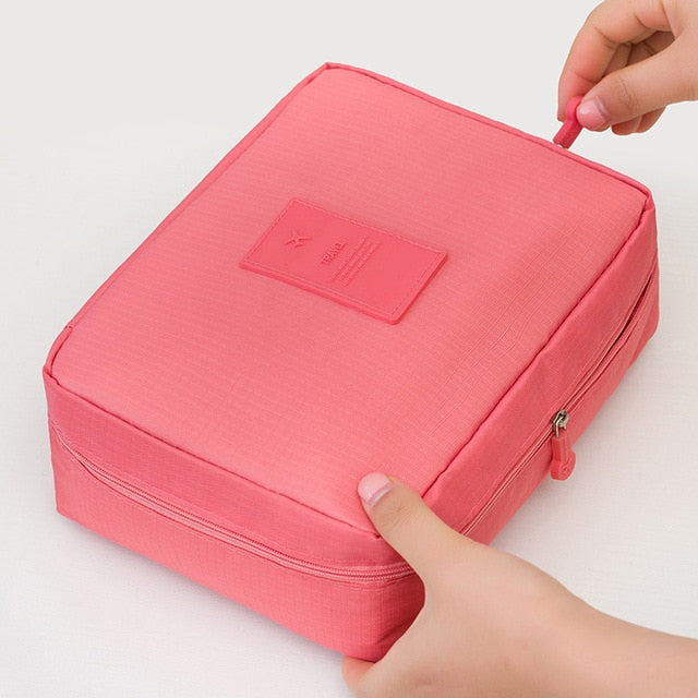 Reisvriendelijke waterdichte cosmetica organizer, compacte make-up tas met meerdere vakken.