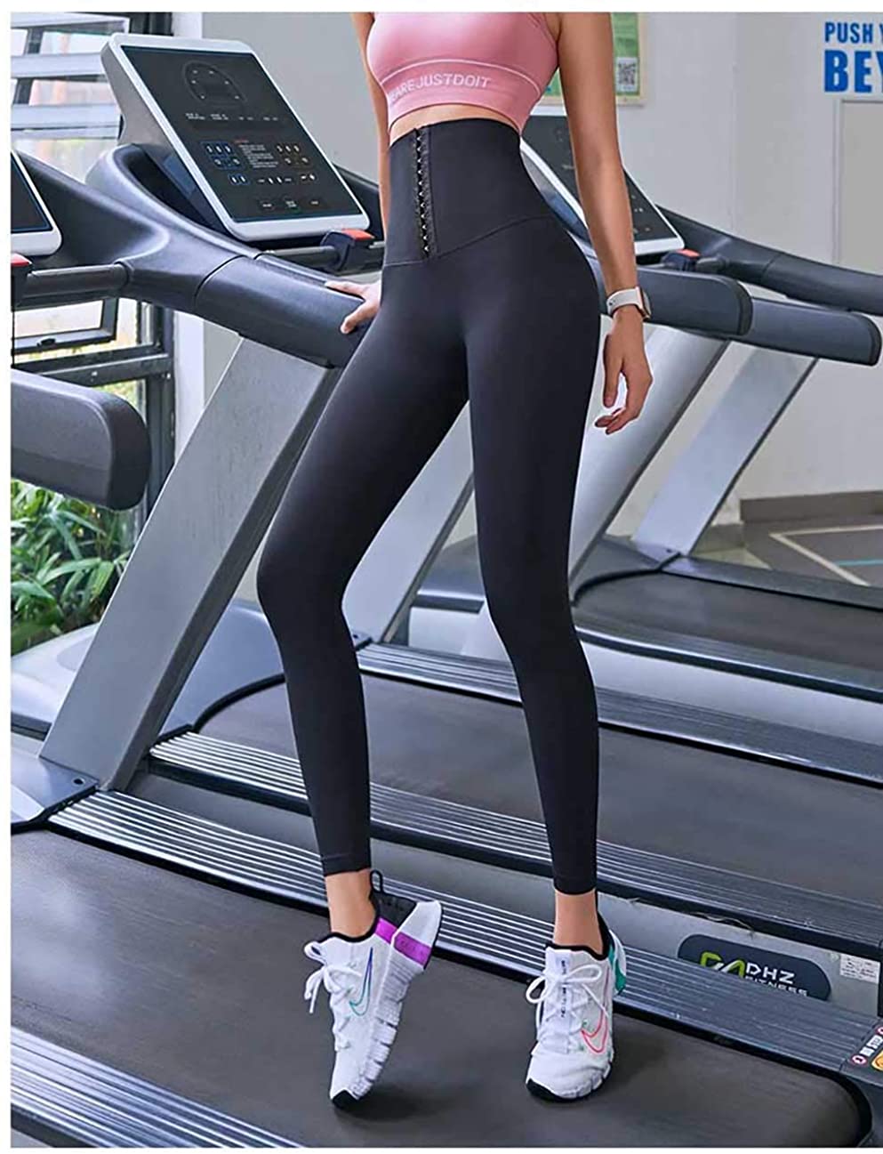 Grijze dames compressie legging met hoge taille, biedt buikcontrole & comfort tijdens elke activiteit.