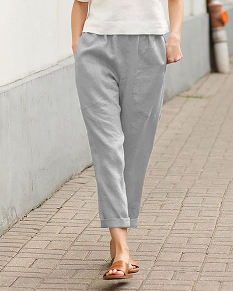 Modieuze damesbroek: losse cropped chino met comfortabele elastische taille en zijzakken.