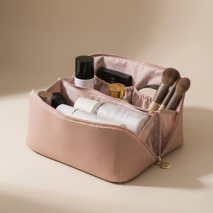 Roze draagbare toilettas van TidyBloom, ideaal als reisorganizer voor make-up en beauty producten.
