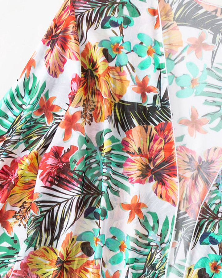 Zomerse driedelige bikini set voor dames met bloemenprint, perfect voor vakantie en strand.