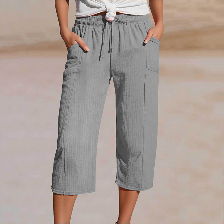 Veelzijdige zomerbroek voor dames, geschikt voor reizen en dagelijks gebruik, met praktische zakken.