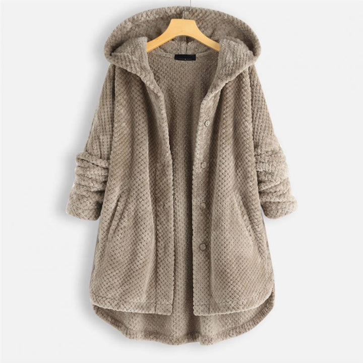 Warm damesvest met rits en capuchon, modieus en comfortabel voor koudere dagen. Stijlvolle outerwear.