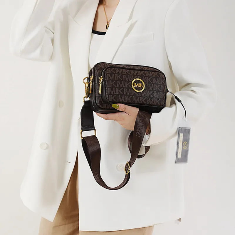 Praktische beige schoudertas voor dames met ruim interieur en meerdere vakken, essentieel mode-accessoire.
