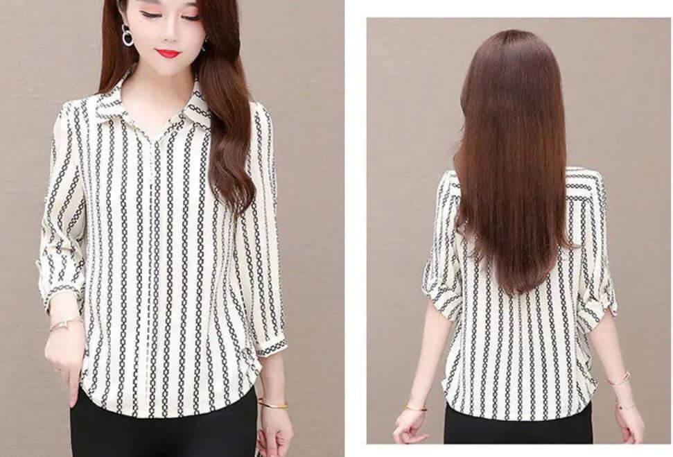 Elegante dameskleding: stijlvolle blouse met knopen, lange mouwen en comfortabele pasvorm.