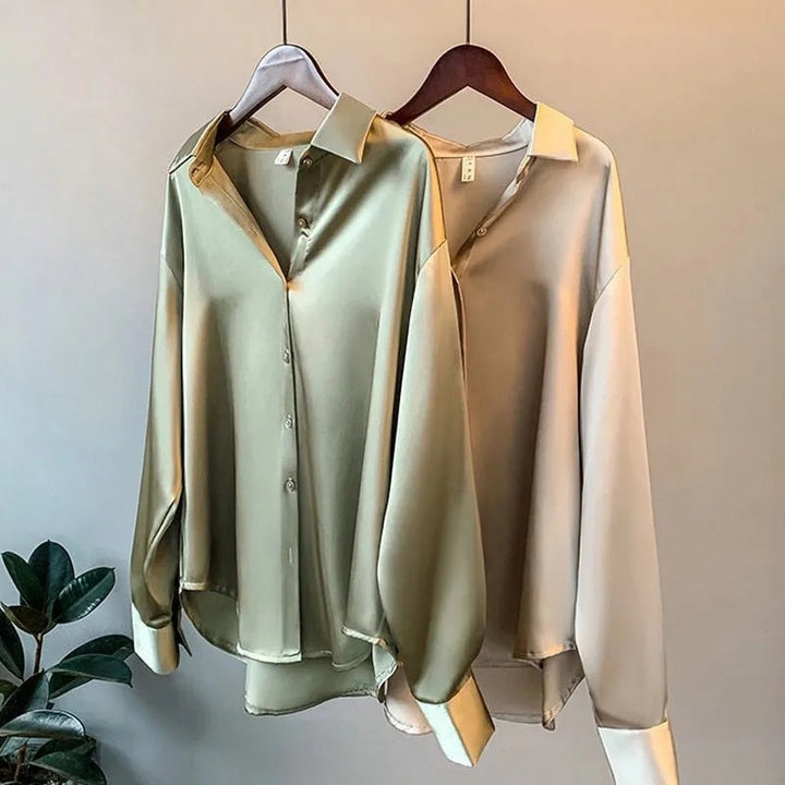 Dames elegante blouse met lange mouwen, klassiek design en knoopsluiting. Stijlvol en comfortabel voor elke gelegenheid.