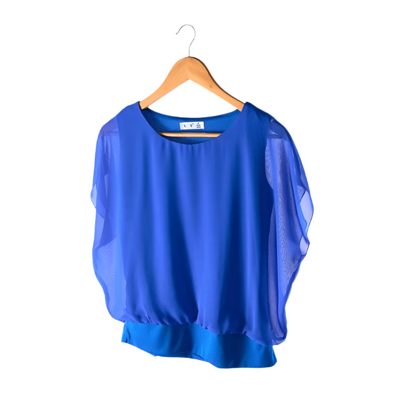 Stijlvolle dames blouse met ruche mouwen en losse pasvorm, perfect als casual chic zomer top of voor op kantoor.