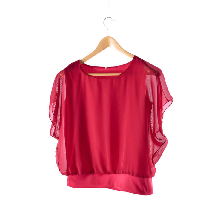 Veelzijdige dames top met ruche mouwen en een losse pasvorm, ideaal voor een elegante kantoor outfit of casual chic.