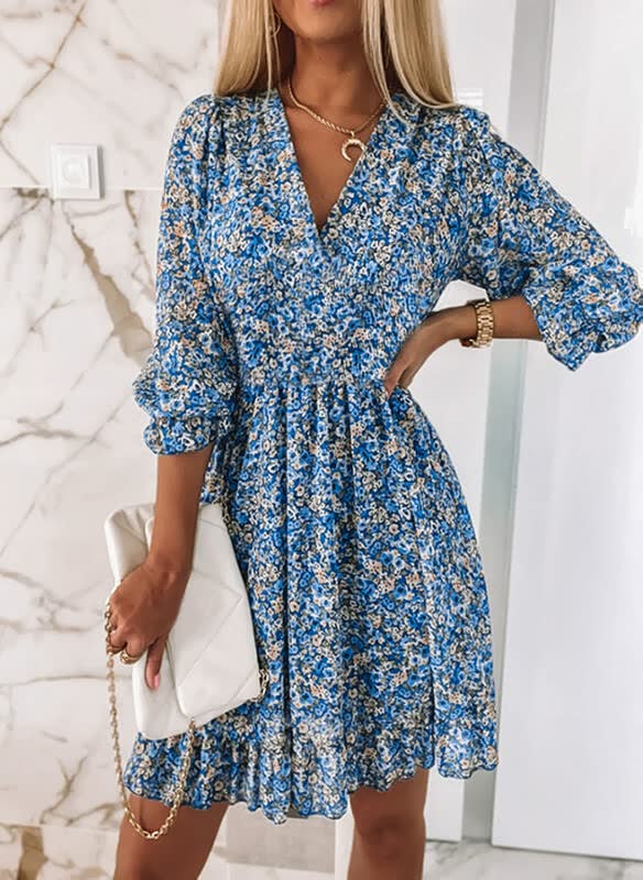 Boho-chique gebloemde mini jurk voor dames, met elegante lantaarnmouwen; een perfecte zomerjurk of feestjurk.