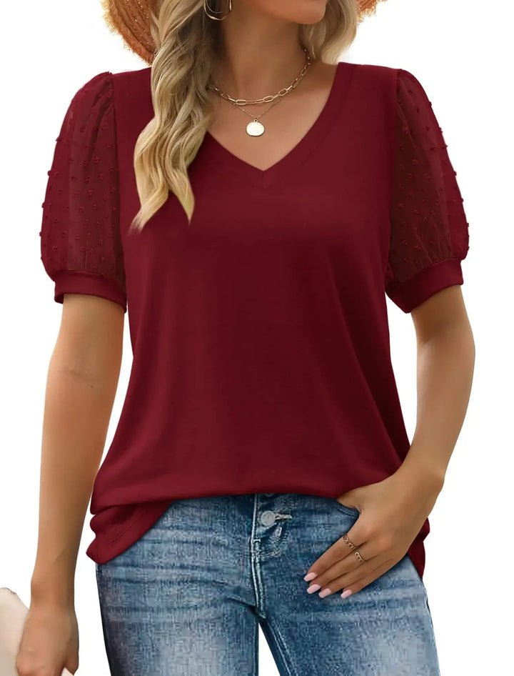 Relaxte pasvorm V-hals top, perfecte aanvulling op elke vrouwenkleding collectie.