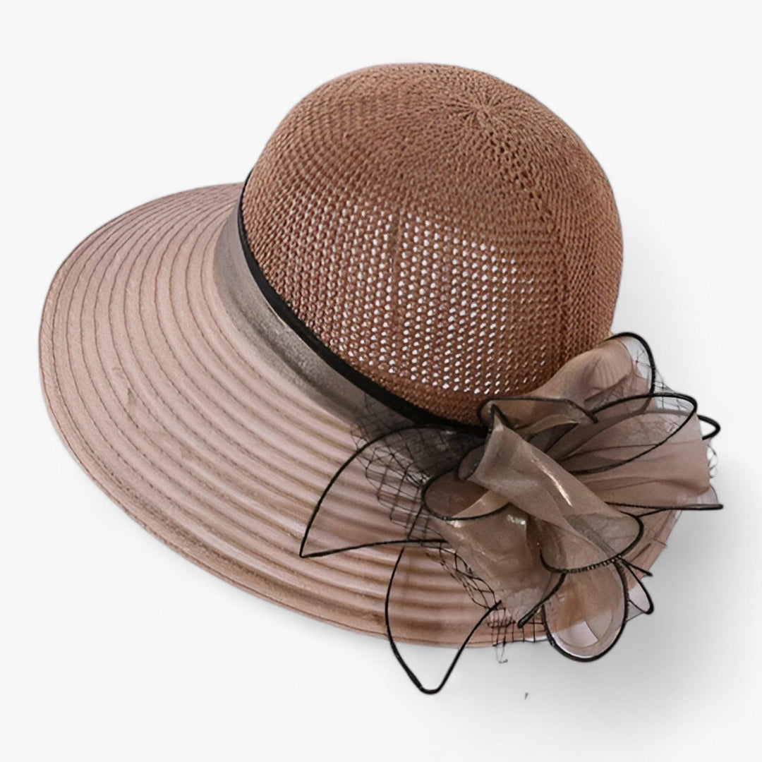 Stijlvolle dames zonnehoed met brede rand, perfect mode accessoire voor een elegante zomerlook.