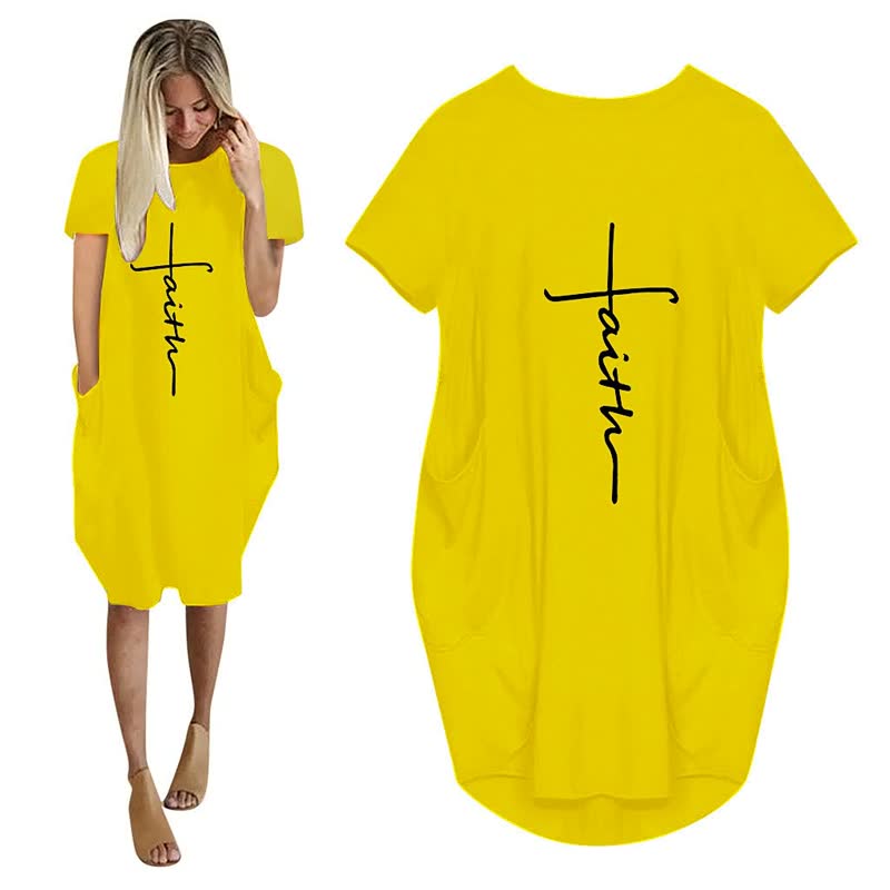Trendy Faith zomerjurk, zwarte kleur, witte 3D print. Met losse pasvorm en zakken, perfect voor casual of feest.