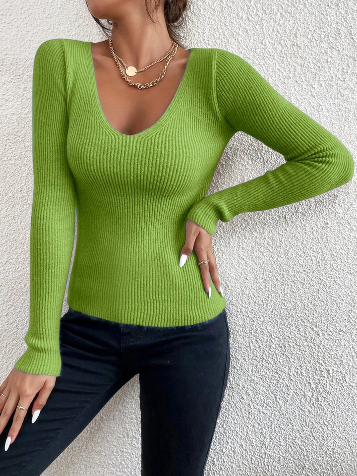 Dames fijngebreide V-hals trui in tijdloos design, perfect voor een comfortabele én stijlvolle look. Ideaal voor dames mode.