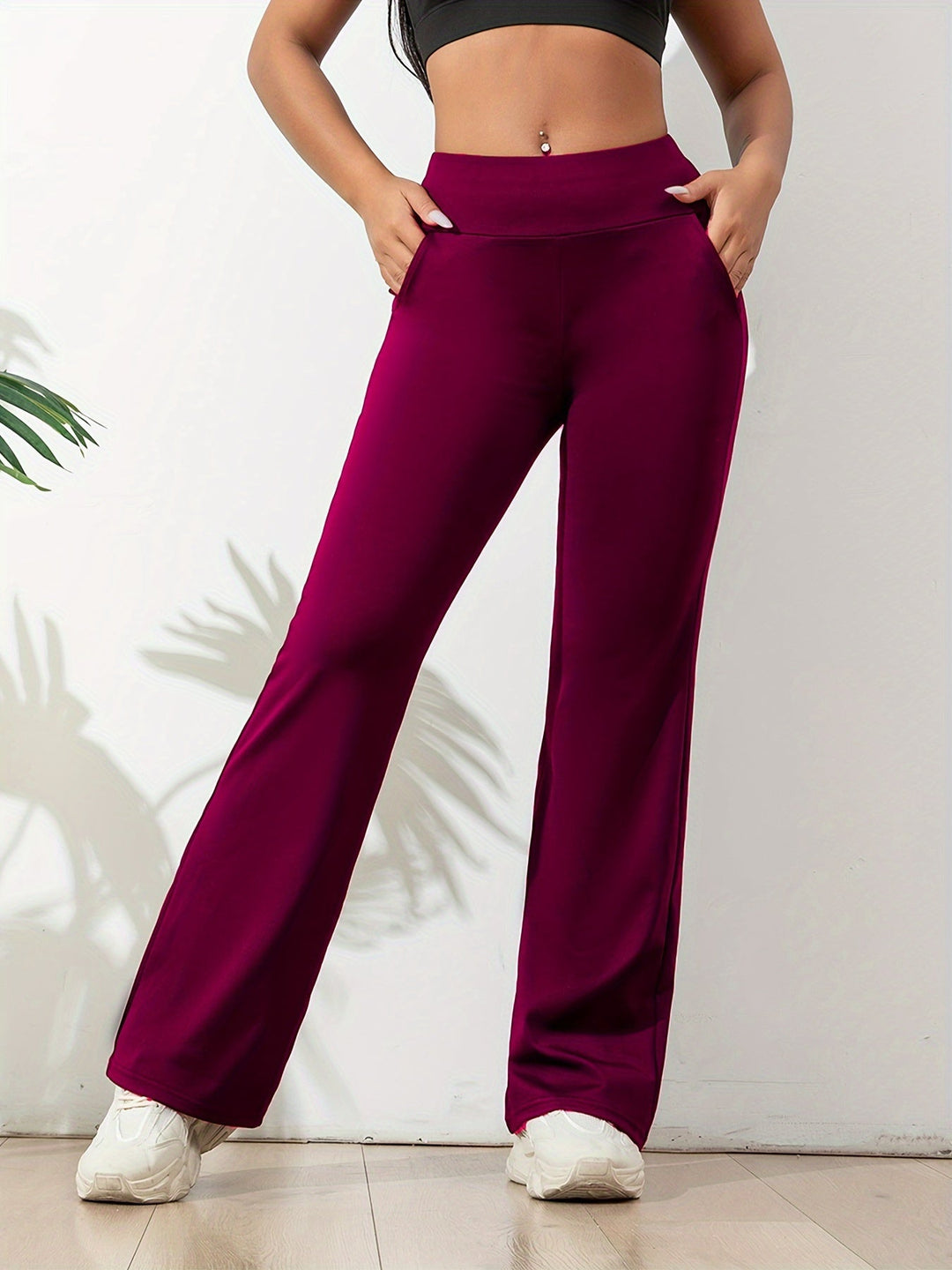 Modieuze dames flared yoga broek, effen kleur, perfect voor sport en vrije tijd. Comfortabel en stijlvol.