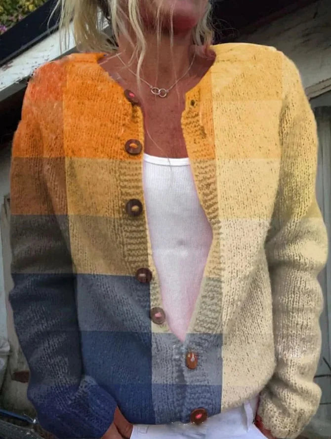 Stijlvolle dames cardigan met bloemenprint, gedragen door model. Comfortabele gebloemde trui, perfect voor elke outfit.