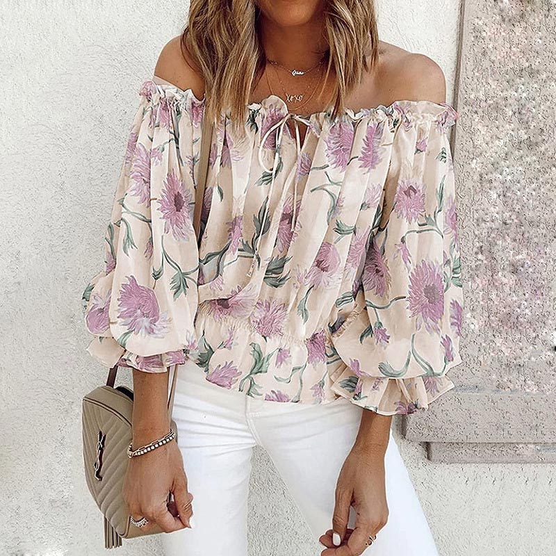 Dames gebloemde chiffon blouse Elvira met elegante ruchesmouwen en bloemenprint.