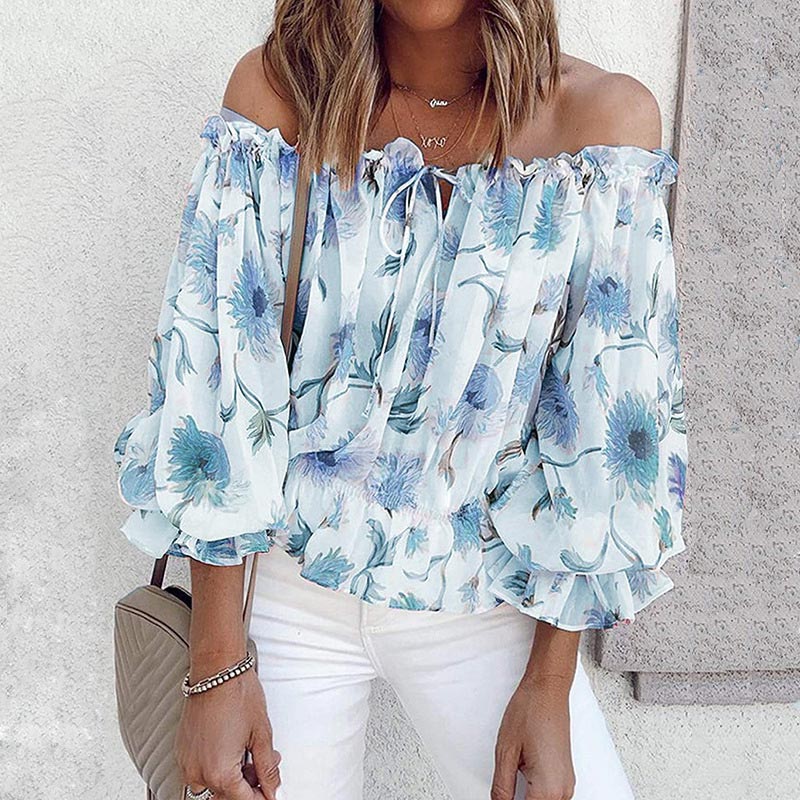 Losse dames blouse met bloemenprint en chique ruchesmouwen, perfect voor de zomer.