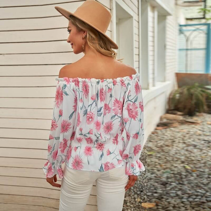 Dames lente blouse Elvira, gebloemd met chique ruchesmouwen en comfortabele losse pasvorm.