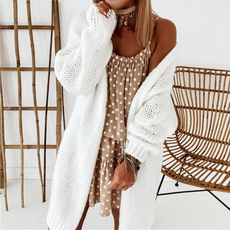 Elegant gebreid damesvest, perfecte aanvulling op elke dameskledingcollectie.