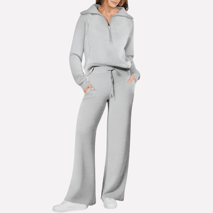 Stijlvolle dames lounge set van gebreid materiaal. Comfortabele casual kleding met lange broek en bijpassende top.