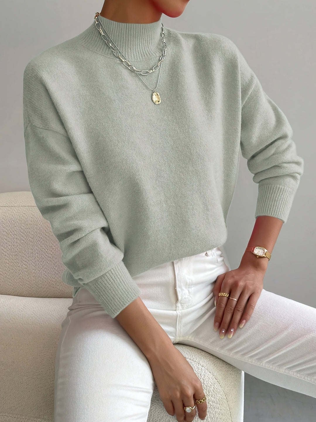 Warme gebreide damestrui met elegante hoge kraag, perfect voor casual of elegante herfst outfits.