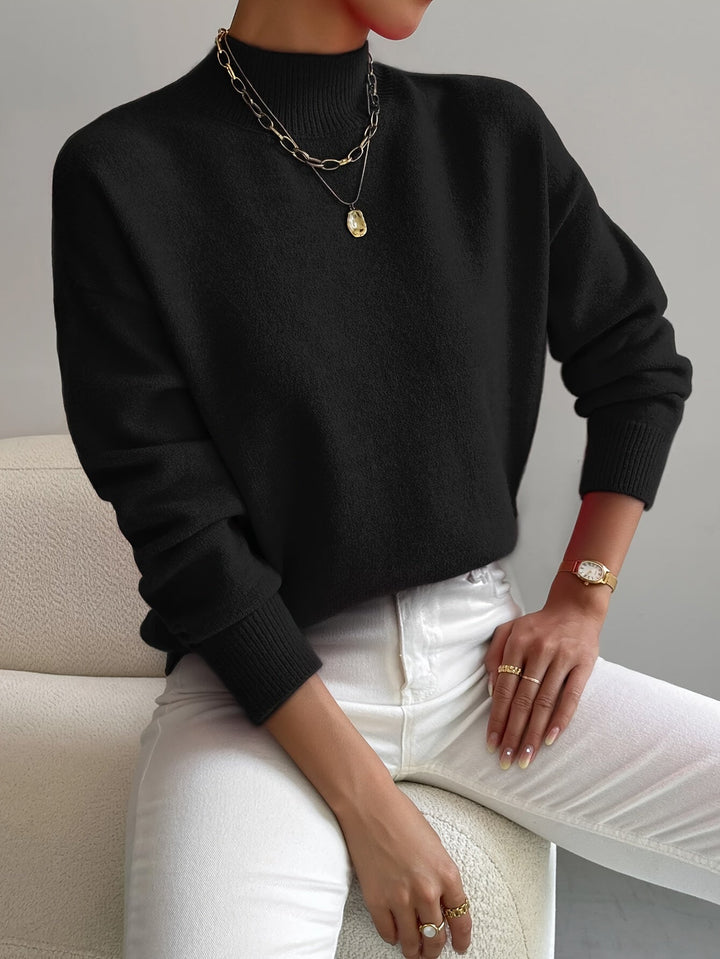 Gebreide damestrui met een warme col en lange mouwen, perfect voor de wintercollectie.