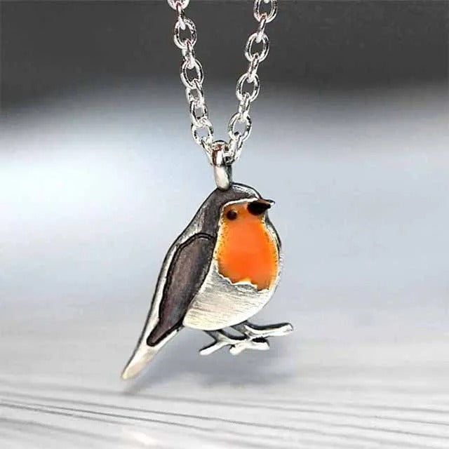 Geluksvogel sieradenset voor dames, ketting en oorbellen met roodborstje, perfect symbool voor een nieuw begin.