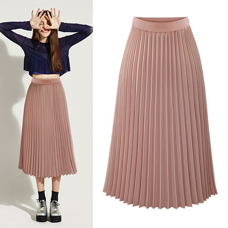 Zomerse dames plooirok met hoge taille. Elegant, trendy en comfortabel voor een vrouwelijke outfit.