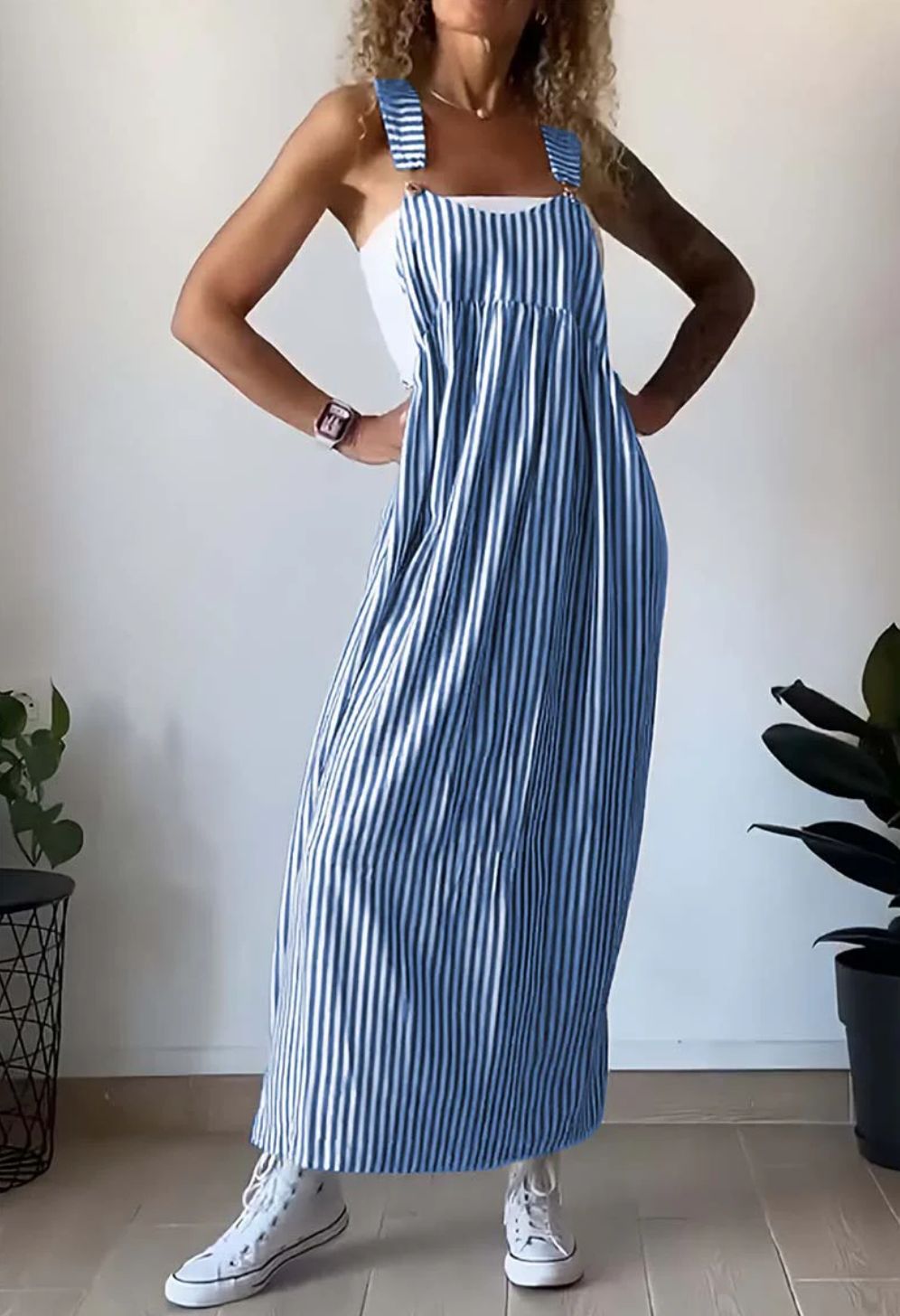 Zomerse gestreepte dames jumpsuit met comfortabele, losse pasvorm, perfect voor ontspannen dagen.