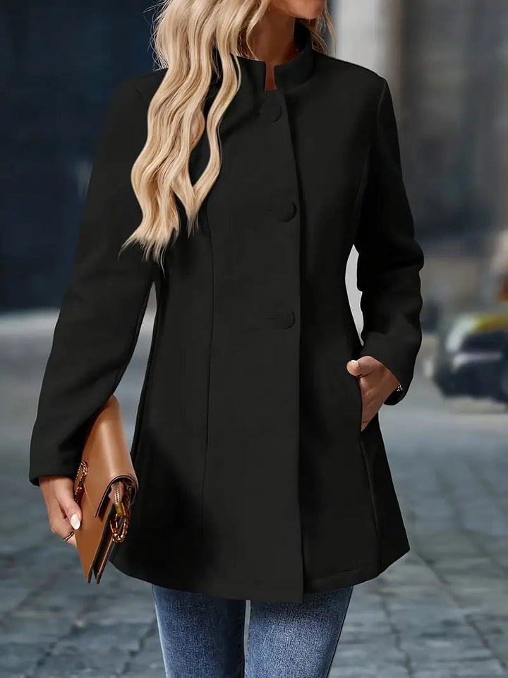 Camel winterjas dames, getailleerd model met elegante A-lijn pasvorm. Halflange jas.