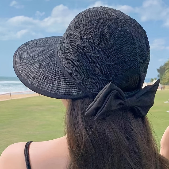 Veelzijdige gevlochten dames zomerhoed met strik, voor strand, stad en vakantie.