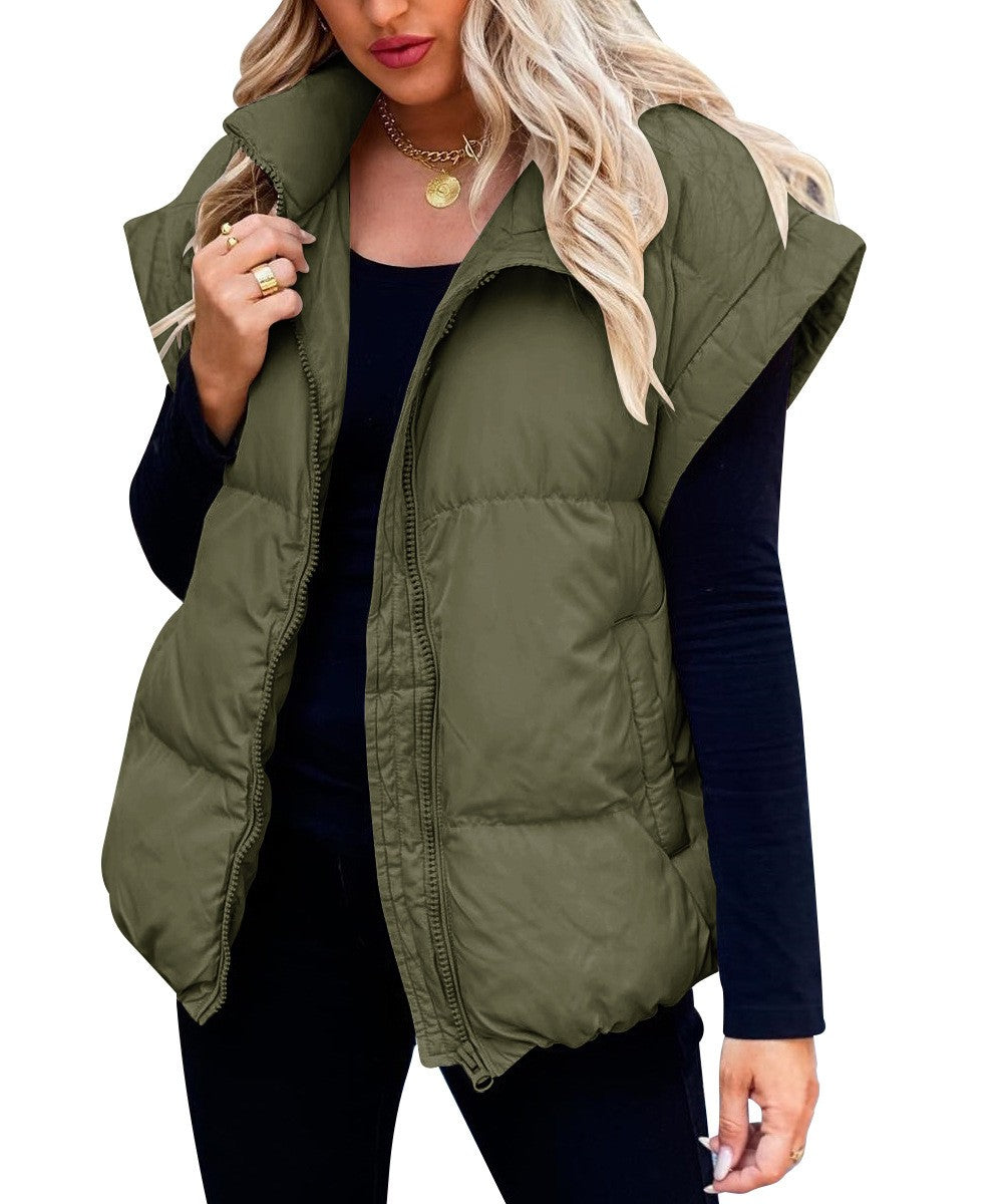 Modern dames mouwloos vest, een veelzijdige gewatteerde puffer voor trendy winterlooks.