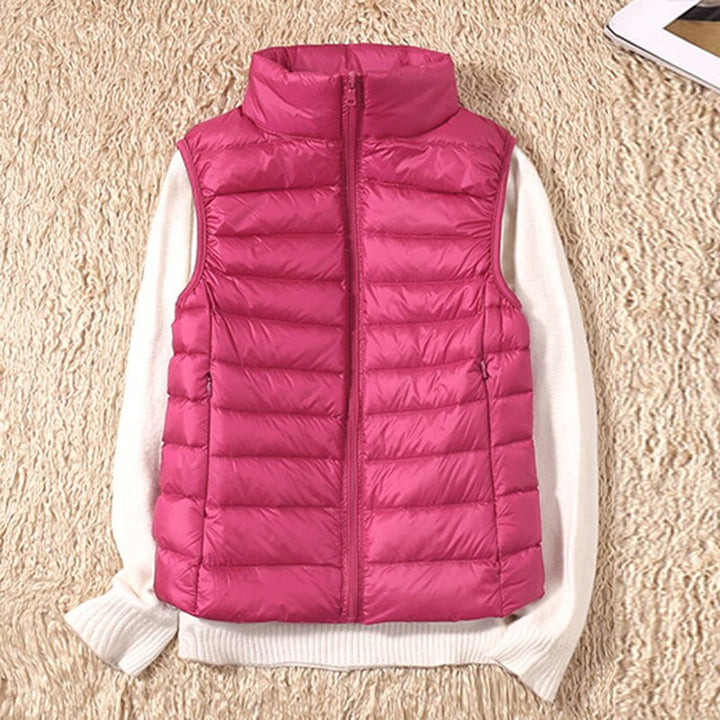 Gewatteerde dames bodywarmer Juliette met praktische ritszakken, lichtgewicht en ideaal voor outdoor.