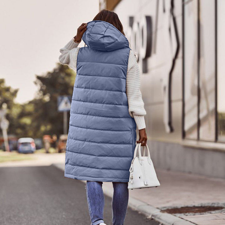 Dames gewatteerde bodywarmer met capuchon, perfect voor een stijlvolle en warme laag over je outfit.