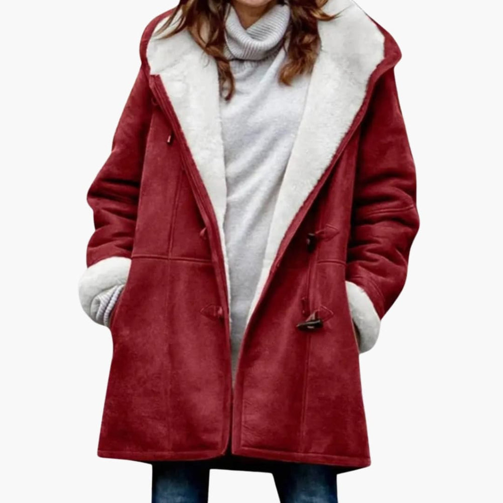 Warme gewatteerde dames winterjas met capuchon en unieke toggle sluiting. Comfortabele bovenkleding.