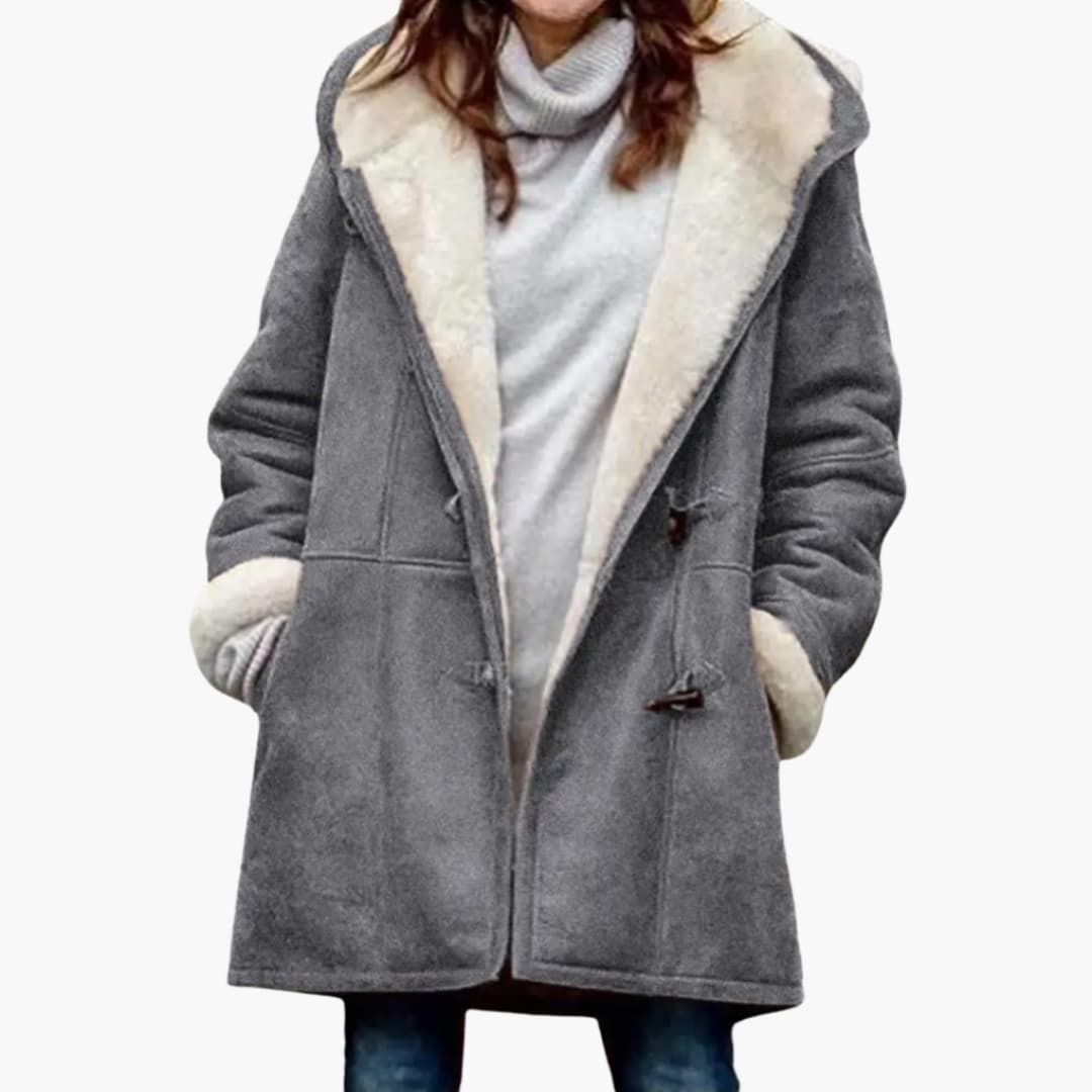 Nieuwe dames gewatteerde winterjas met capuchon en toggle sluiting. Warm, comfortabel en modieus.