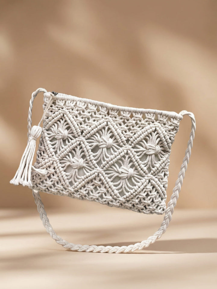 Dames geweven schoudertas, perfect voor de zomer. Stijlvol boho accessoire.