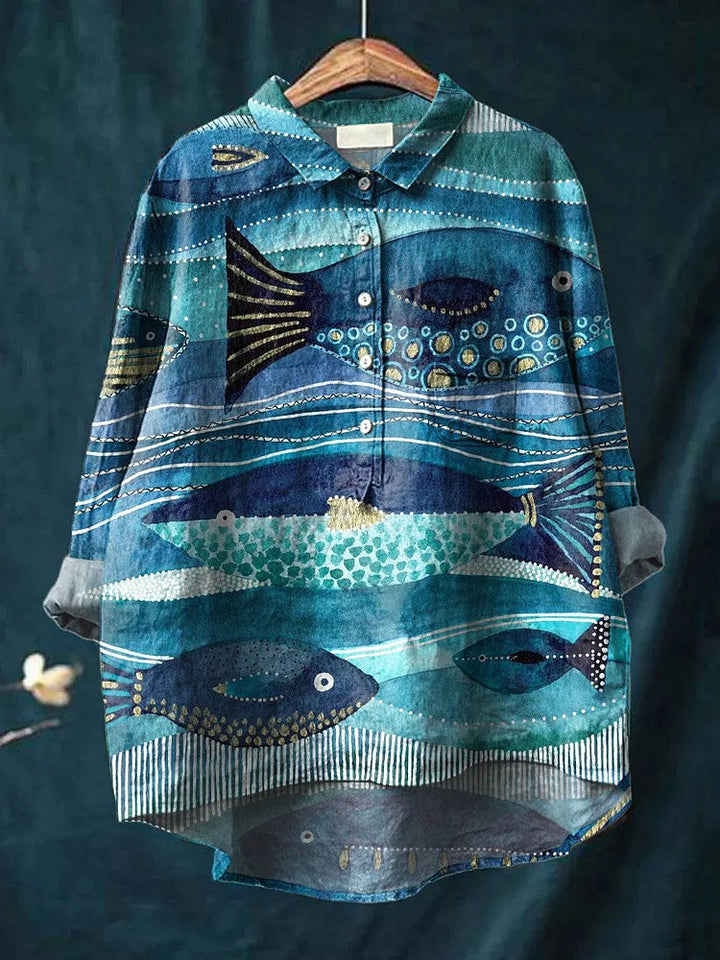 Expressief dames shirt met lange mouwen, voorzien van levendige oceaan print.