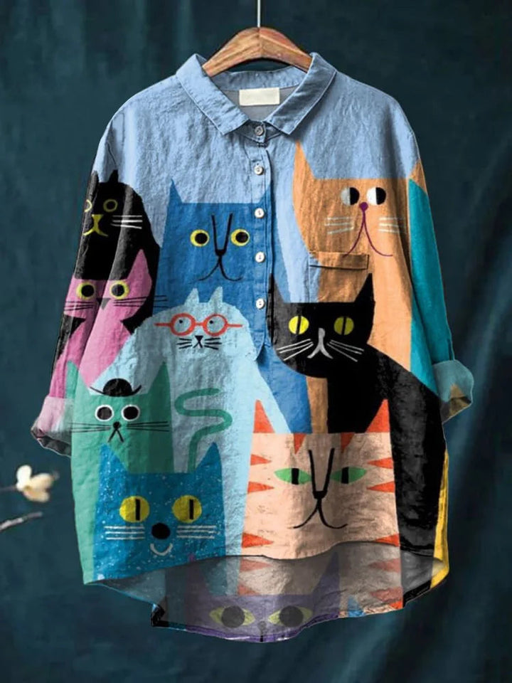 Modieus dames button-up shirt met lange mouwen en abstracte grafische print.