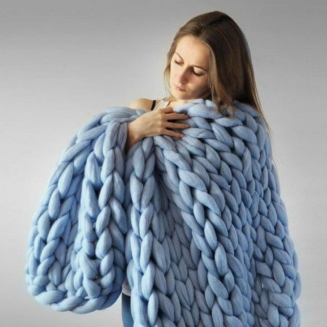 Grof gebreide deken, een warme dames plaid voor gezellige avonden thuis.